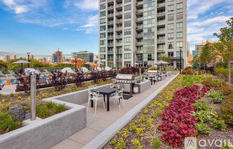 A patio area with tables and chairs is available for use.