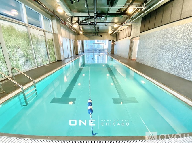 A swimming pool with the text "ONE CHICAGO" on the bottom.