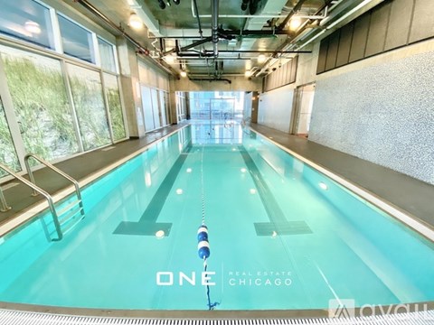 A swimming pool with the text "ONE CHICAGO" on the bottom.