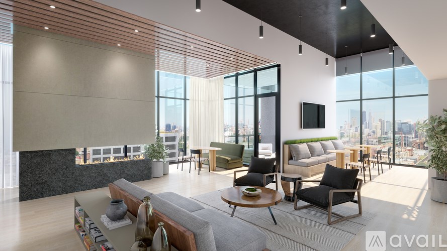 A modern living room with a large window overlooking the city.