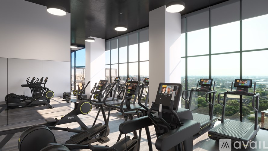 A gym with treadmills and exercise bikes is available for use.