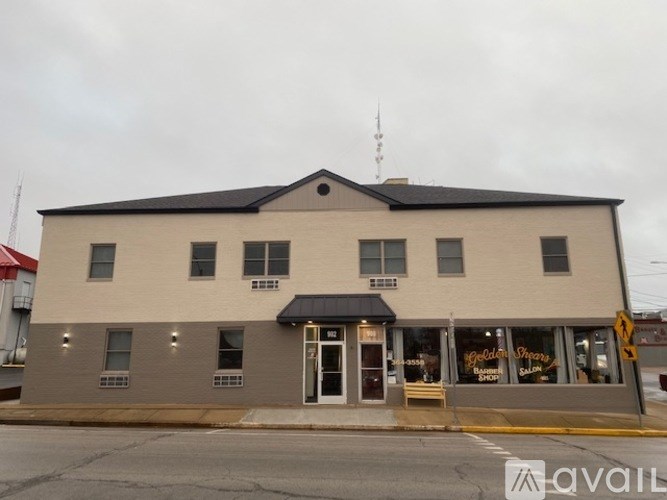 A building with a sign that says "Spalding's Improvement Store" on it.