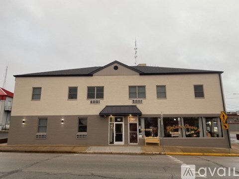 A building with a sign that says "Spalding's Improvement Store" on it.