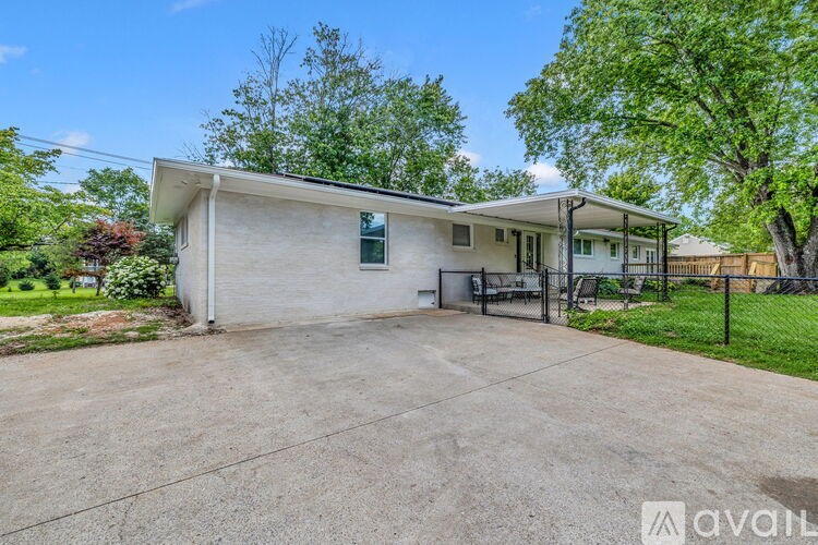 A house with a garage is available for rent.
