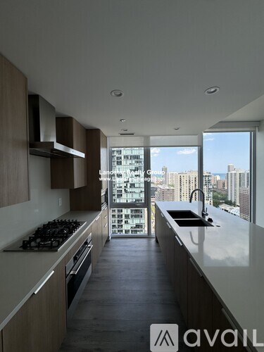 A modern kitchen with wooden cabinets and a stove top oven.