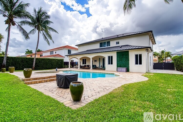 A house with a pool in the backyard.