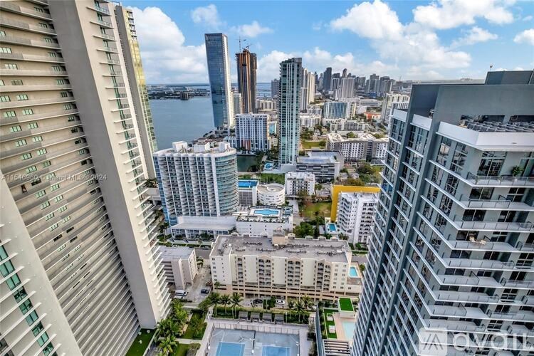 A view of a cityscape from a high-rise building.