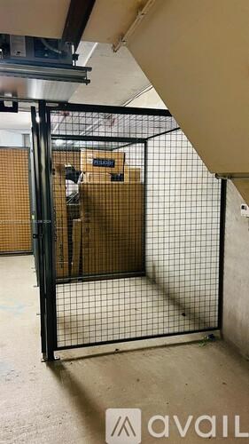 A metal gate with a mesh design is closed.