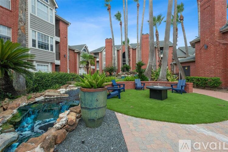 A backyard with a pool and a patio area.