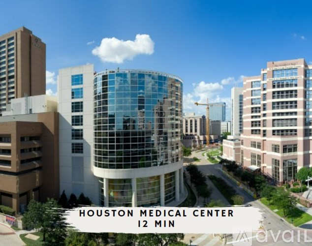 A view of the Houston Medical Center with a sign indicating it is a 12-minute drive away.