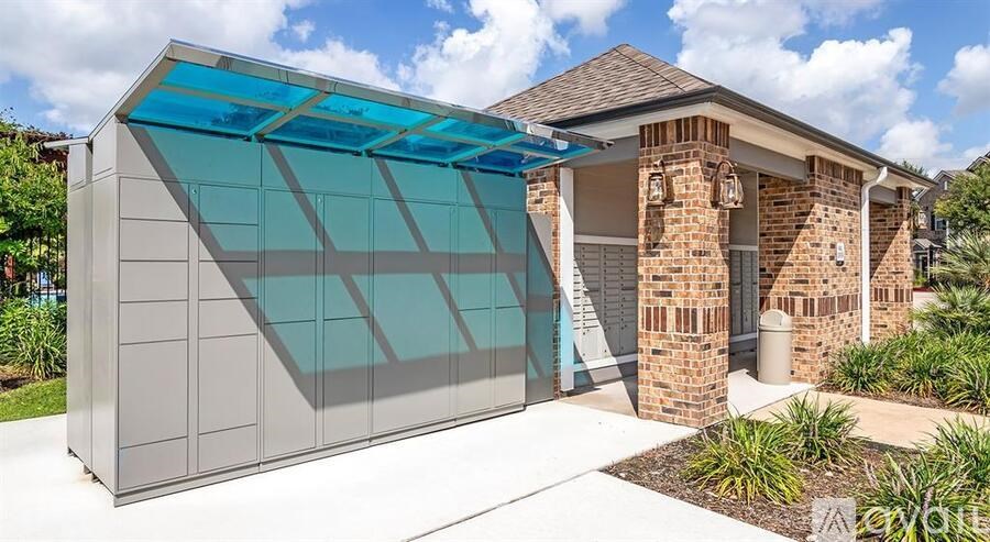 A modern house with a glass wall extension.