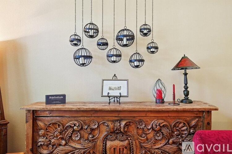 A wooden cabinet with a sign that says "Adults Only" and a red lamp on top.