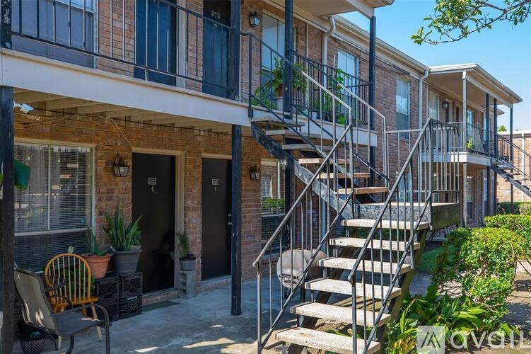 A house with a staircase leading to the second floor.