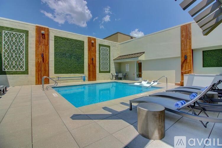 A modern house with a pool in the backyard.