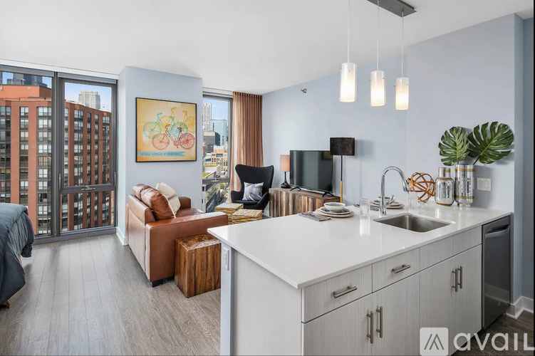 A modern kitchen with a view of the city.