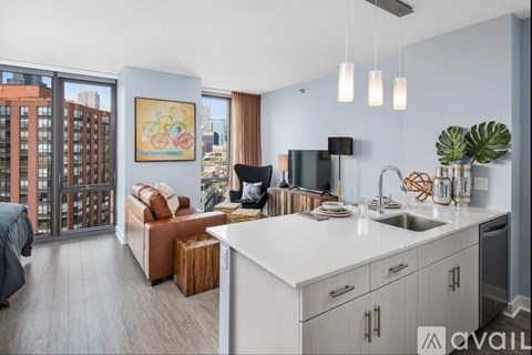 A modern kitchen with a view of the city.