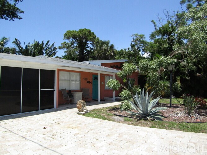 A house with a garden in front.