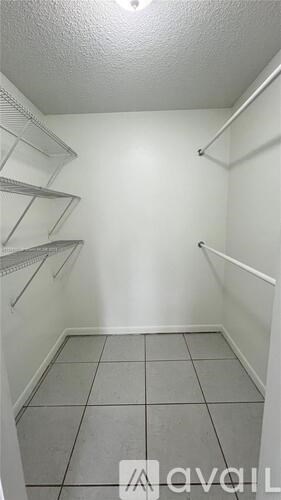 A white refrigerator freezer with a white background.
