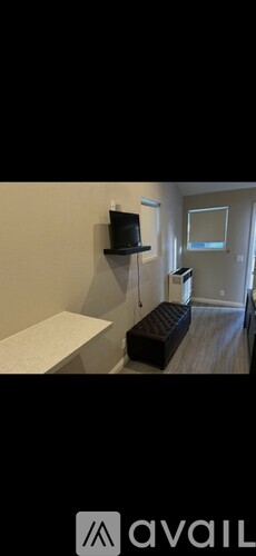 A kitchen with a sink and a window.