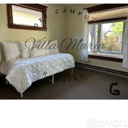 A bedroom with a bed, window, and a sign that says "Villa Martin".