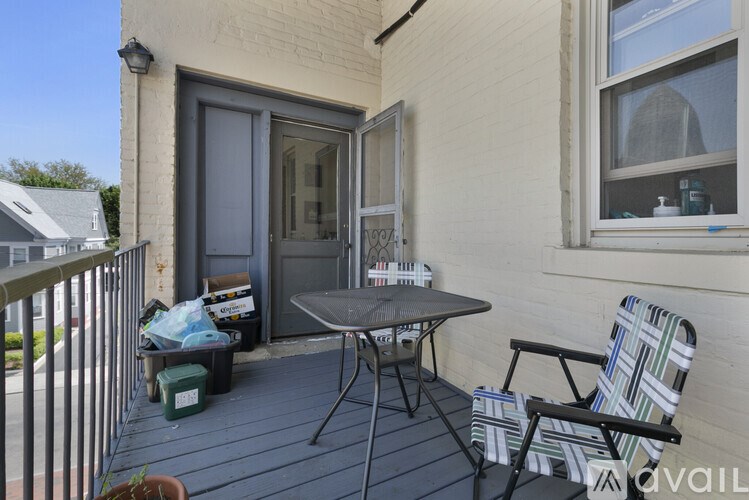 A patio with a table and chairs is shown.