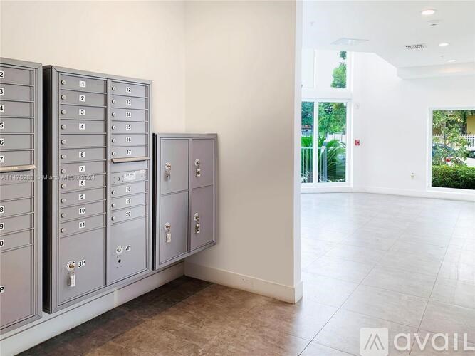 A row of grey lockers with numbers on them.