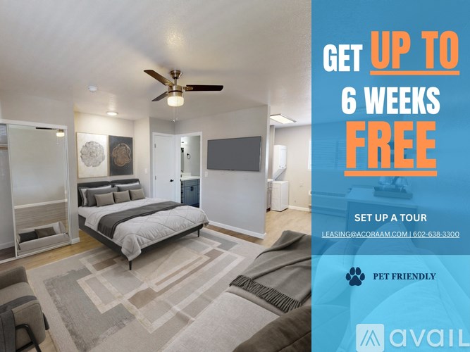 A bedroom with a bed, a rug, and a ceiling fan, with an advertisement for a free first month of a service.