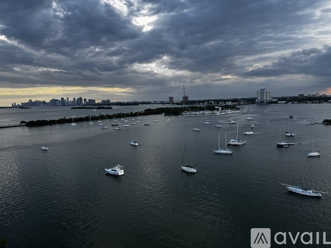 A large body of water filled with lots of boats.