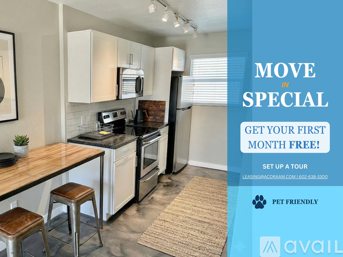 A kitchen with a sign offering a free first month for moving in.