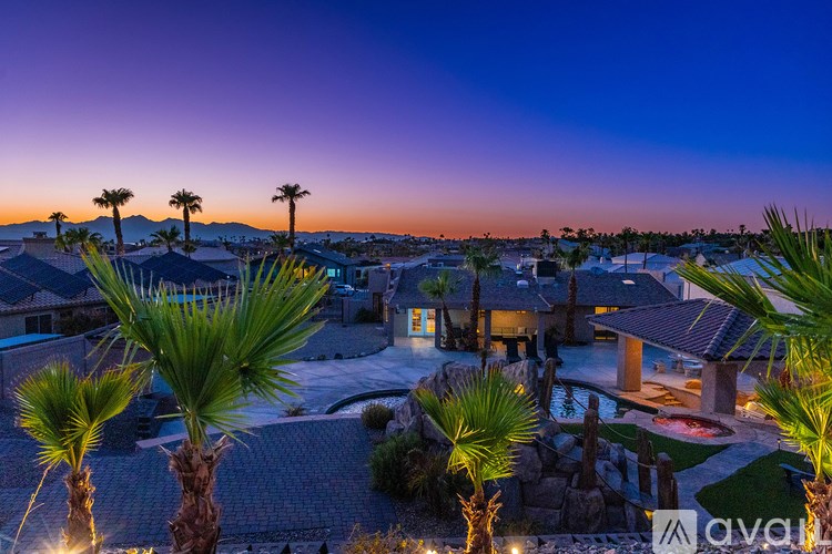 A beautiful view of a residential area with palm trees and houses.