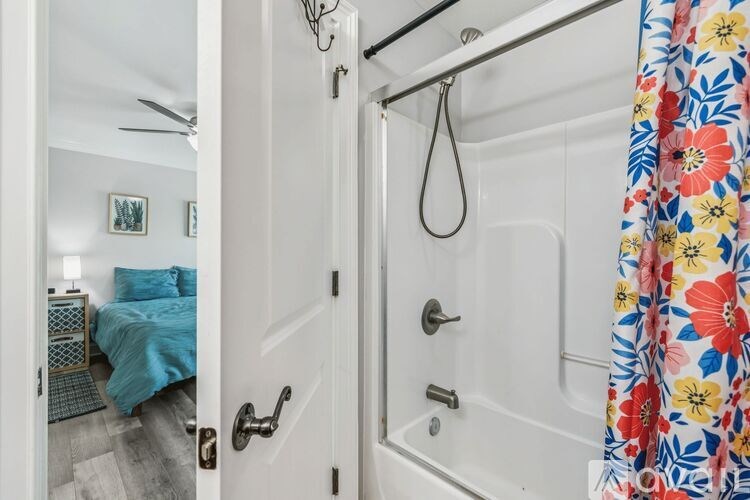 A kitchen with wooden cabinets and stainless steel appliances.