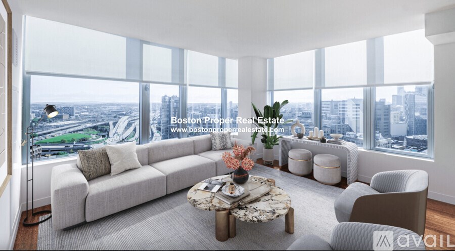 A modern living room with a view of the cityscape.
