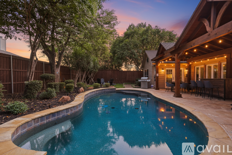 A house with a pool in the backyard.