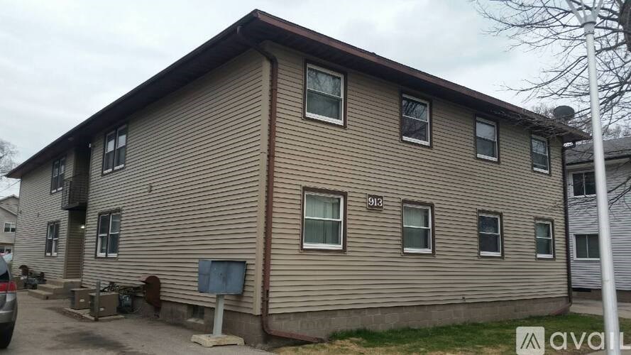A two-story house with a garage on the left side.