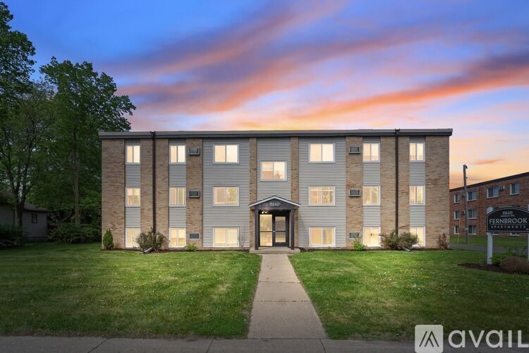 A building with a sign that says "available" in front of it.