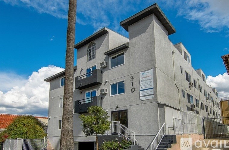 A building with the text "One Month Free" prominently displayed in front of it.