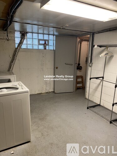 A laundry room with a washer and dryer.