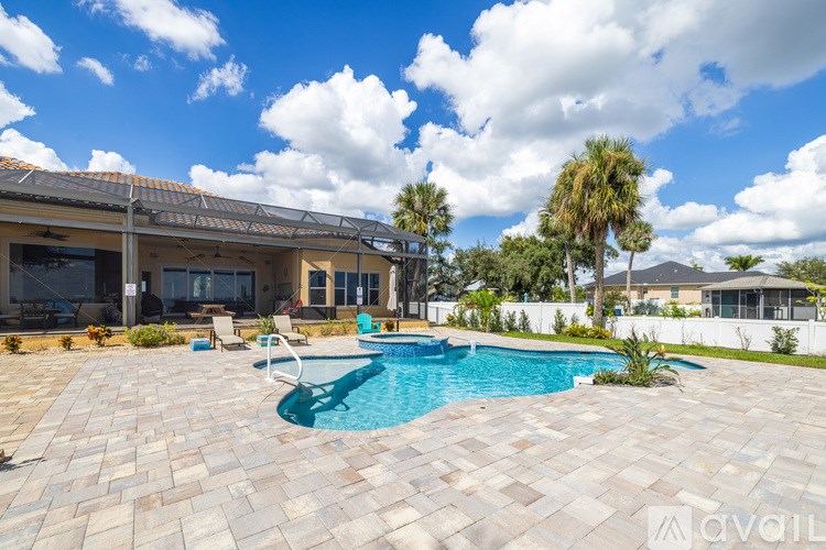 A house with a pool in the backyard.