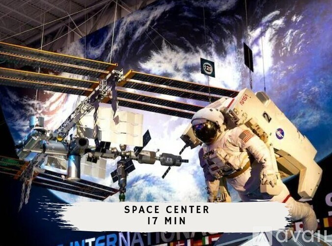 An astronaut is seen from below, working on a space station module with the label "SPACE CENTER 17 MIN" indicating the video length.