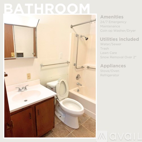 A bathroom with a toilet, sink, and shower.