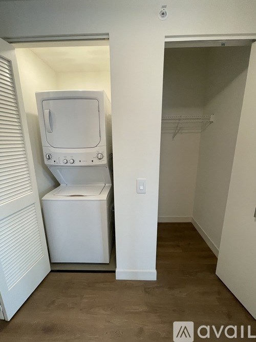 A small white bathroom with a toilet and sink.