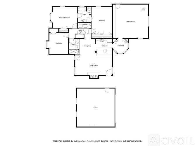 A floor plan for a home with a living room, dining room, kitchen, and two bathrooms.