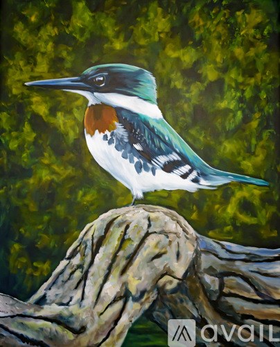 A bird with a blue head and a white belly is perched on a tree stump.