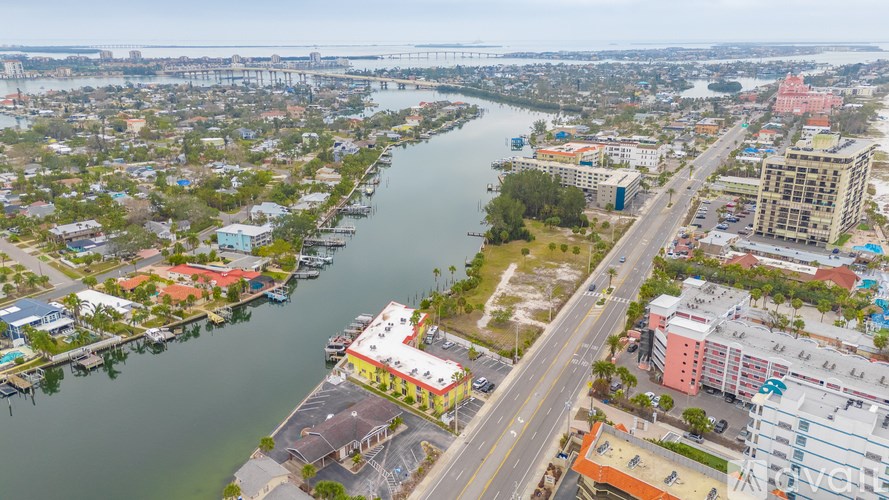 A cityscape with a river running through it.