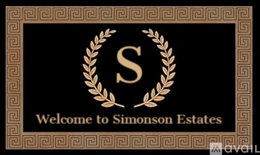 A sign that says "Welcome to Simonson Estates" with a gold laurel wreath and the letter S.