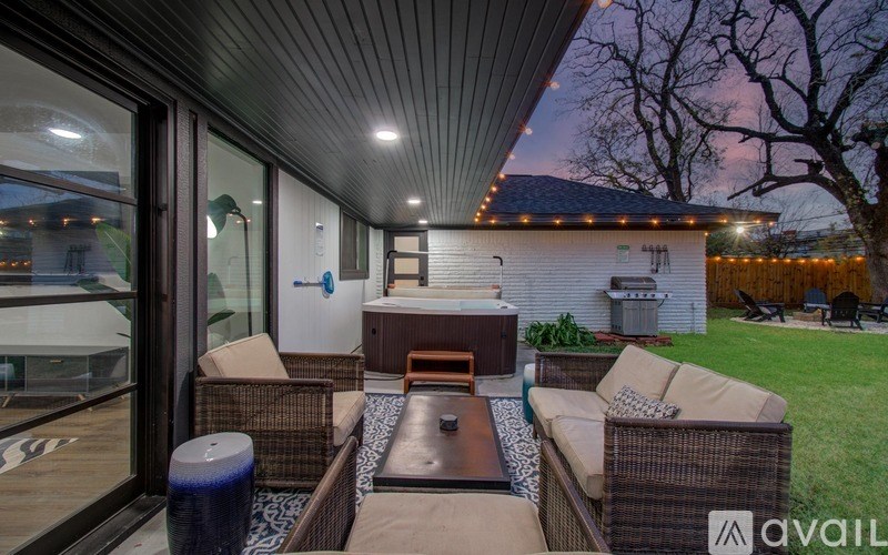 A patio with a table and chairs is shown.