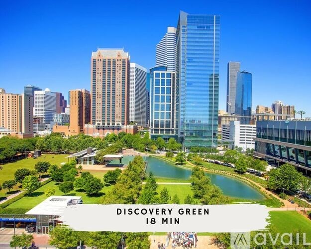 A cityscape with a green space in the foreground and the text "DISCOVERY GREEN 18 MIN" overlaid on the image.