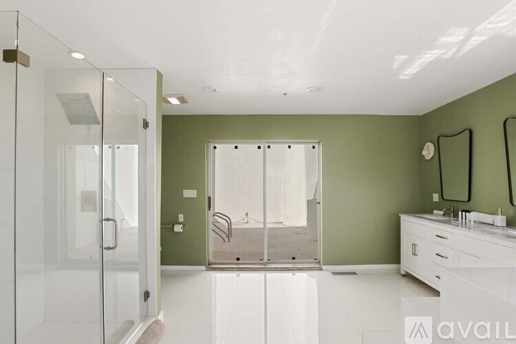 A long hallway with a wall of drawers on the left and a wall of shelves on the right.