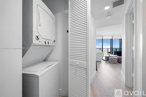 A white oven and dishwasher in a modern kitchen.