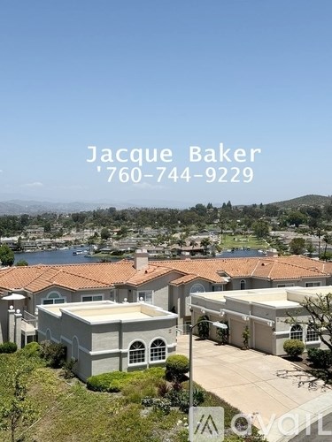A house with the name Jacque Baker and a phone number on it.